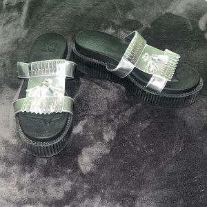 T. U. K. Size 11 Black and Silver Platform Slides